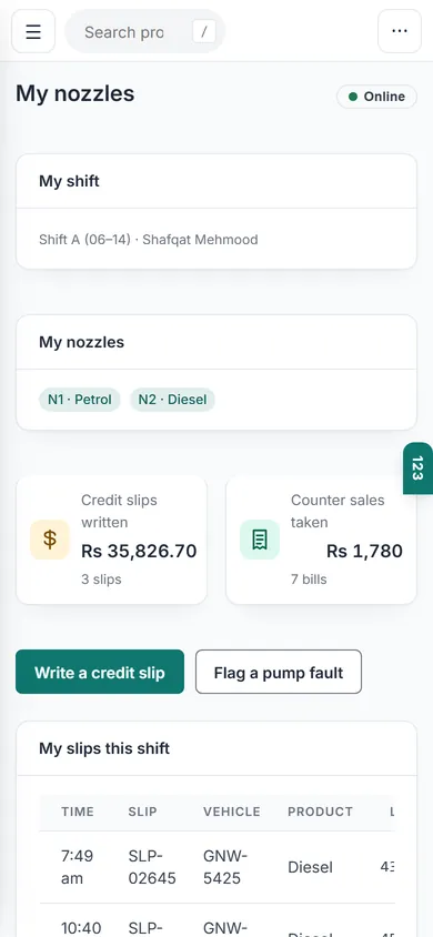 An attendant's nozzles and credit slips on a phone